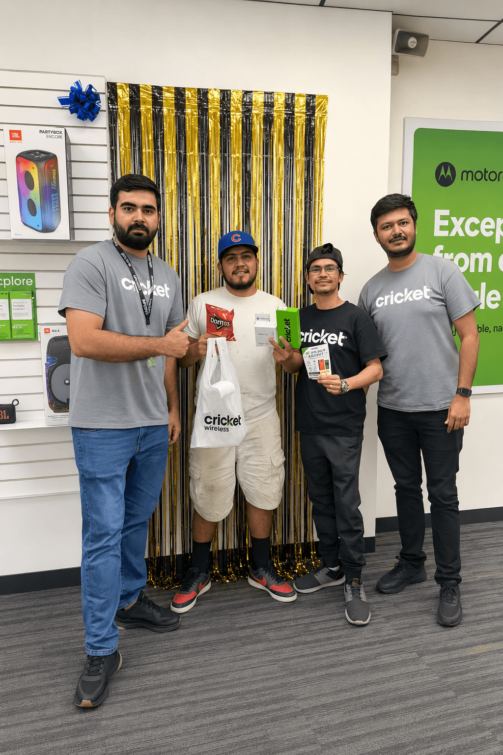 NKB team members with a customer in store