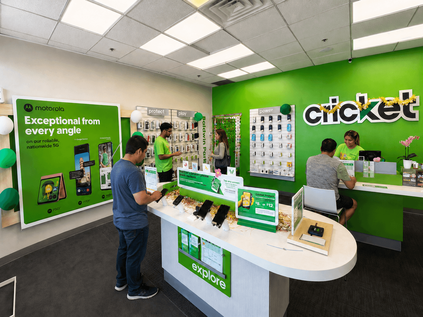 NKB Cricket Wireless store interior with team members helping customers